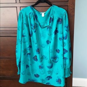 Emerald green blouse with navy flowers.